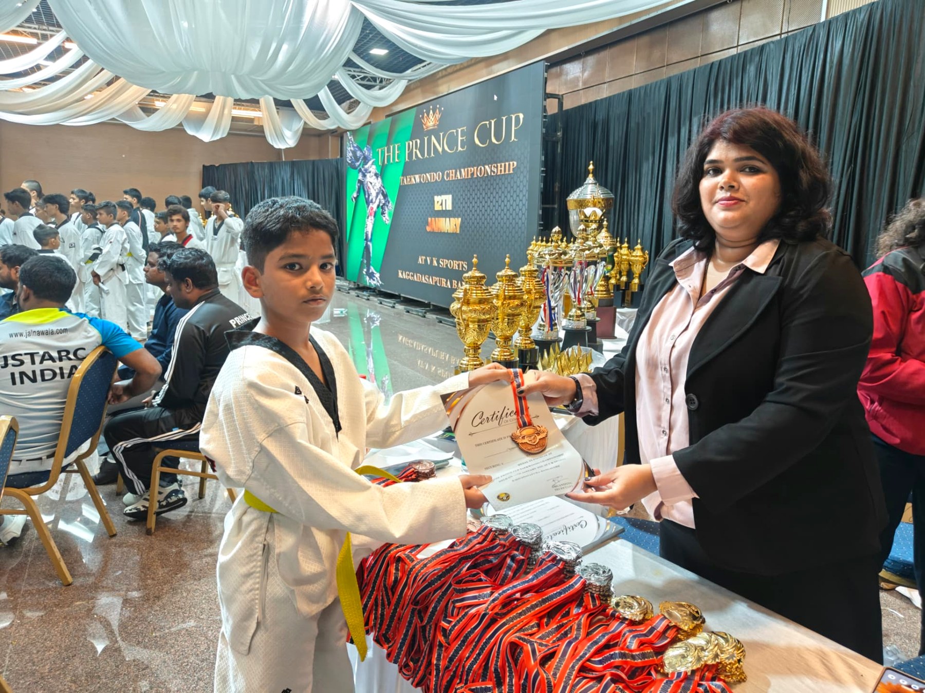 Prince Cup Bangalore — medal and certificate presentation to a JPL student