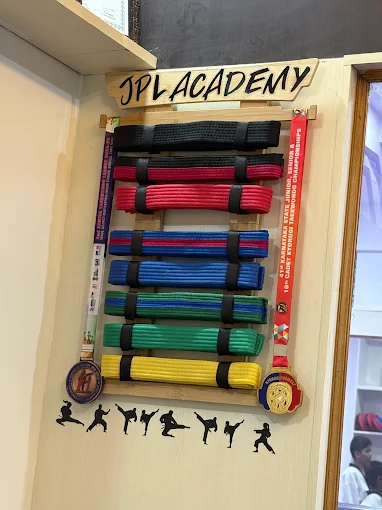 JPL Academy belt display with medals
