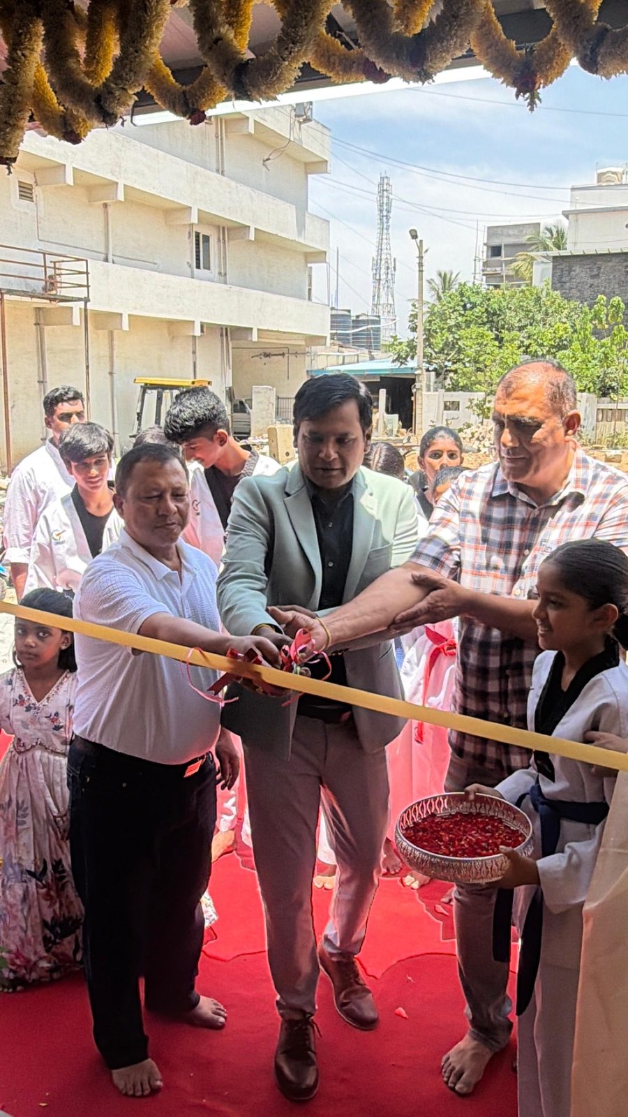 Ribbon-cutting ceremony at the entrance of the new JPL Taekwondo centre