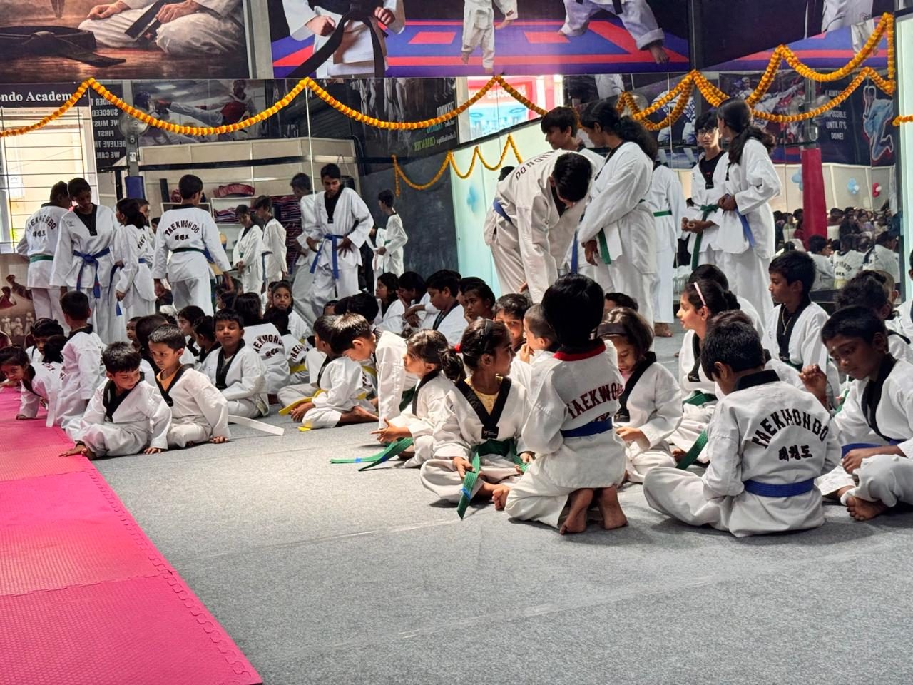 Students gathered on the mat during the opening ceremony